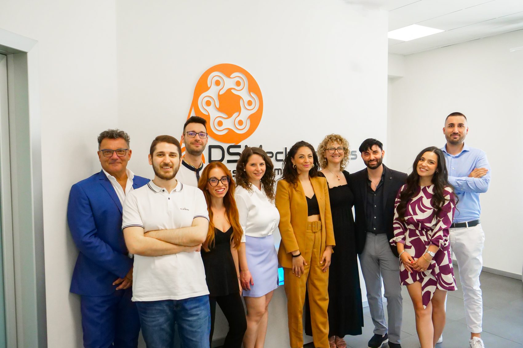 The DS Mechatronics team in front of the headquarters